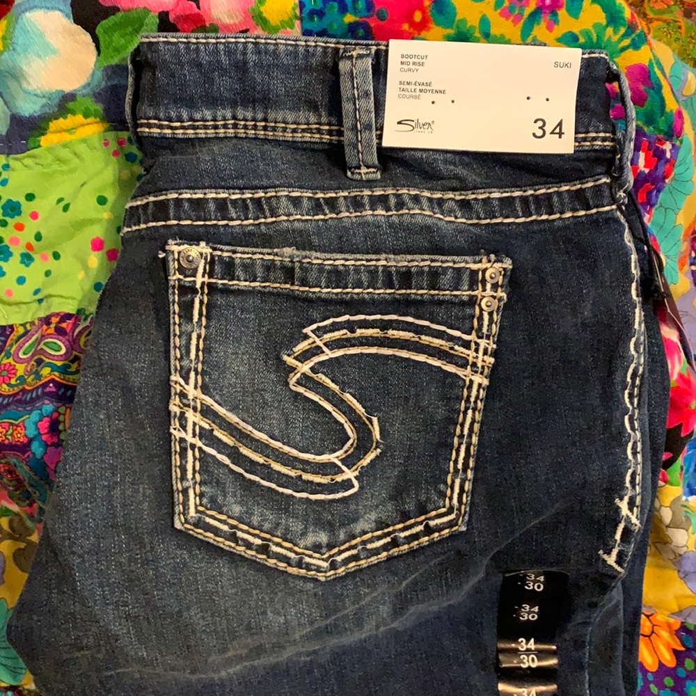 Bootcut mid rise silver jean co